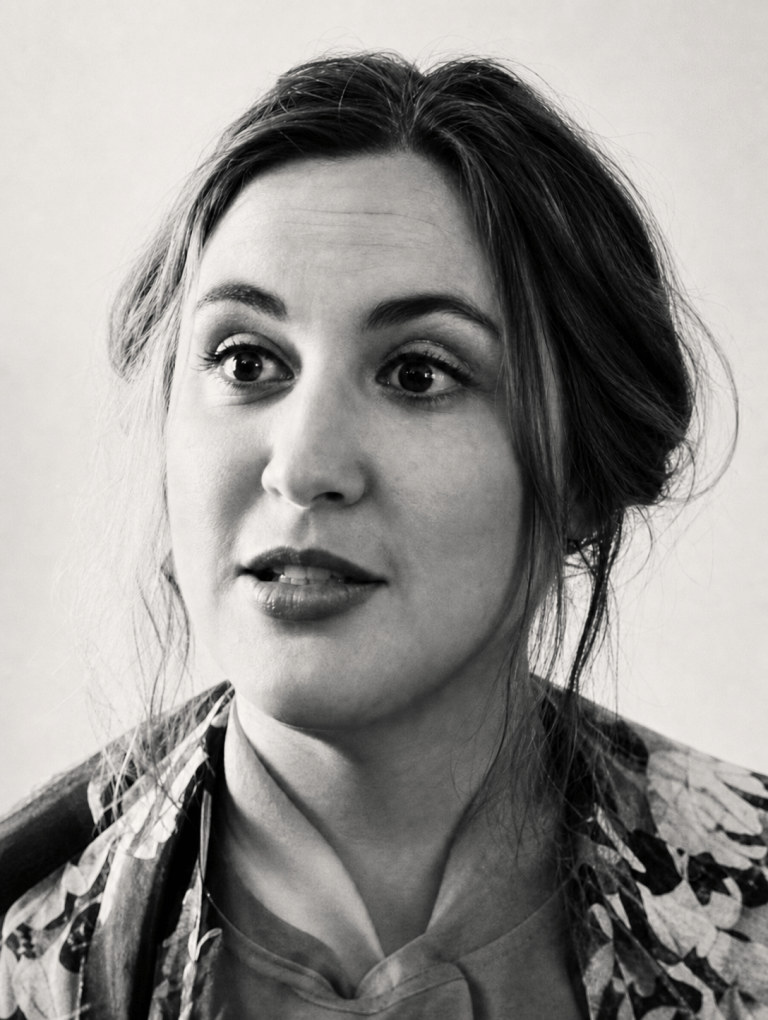 Black-and-white portrait of Heather A. Holliger
